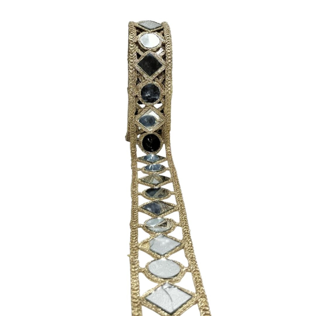Bracelet with geometric design and gemstones on a white background